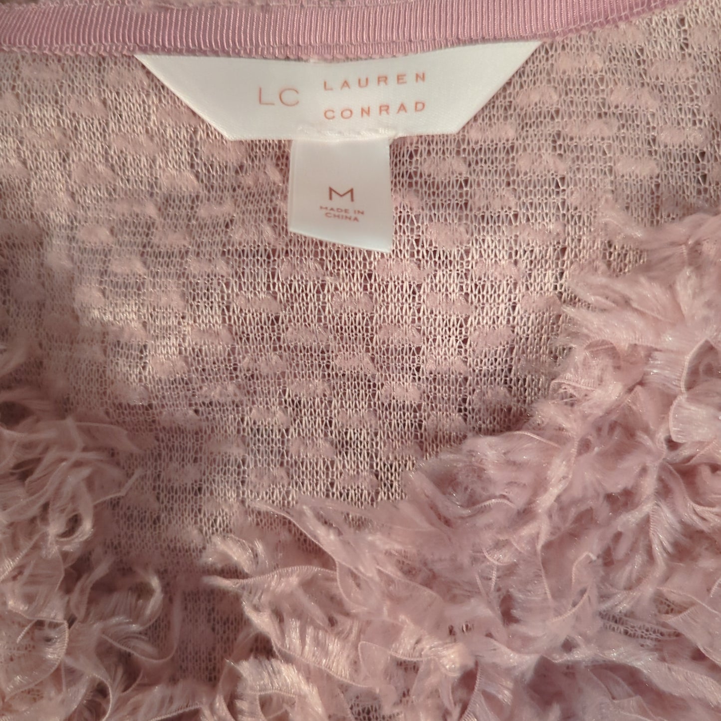 Lauren Conrad Lightweight, Feather like jacketElevate any outfit with the new Lauren Conrad Jacket. Lightweight, open-front design in pale lavender. Perfect fit, medium size. Add to cart now!$99.00Boston304
