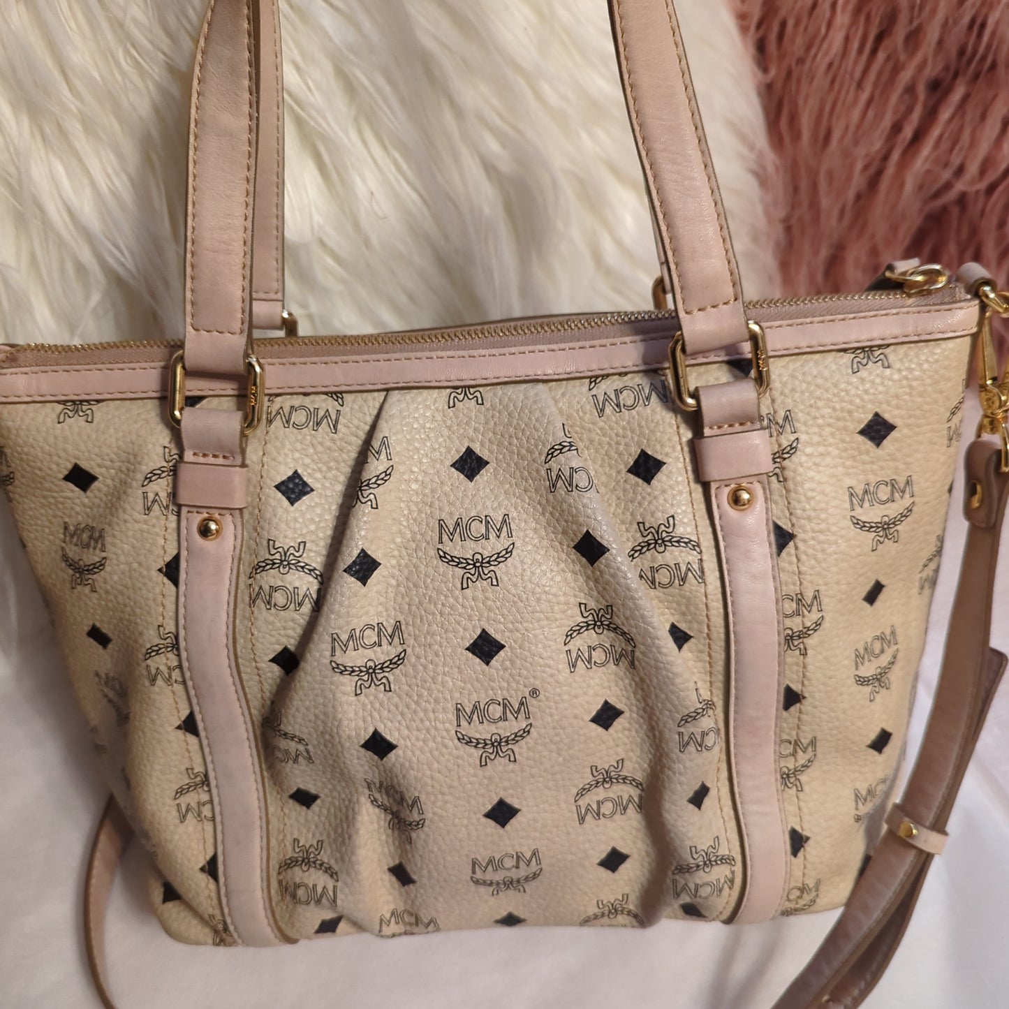 MCM Visetos Leather Monogram bag w/crossbody strap in pale rose and cream.Shop now for the elegant MCM Visetos bag in cream & pale rose. Excellent condition with gold hardware. Perfect classic accessory.$599.00Boston304