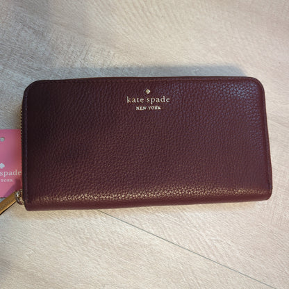 Kate Spade large Continental wallet in cherrywood pebbled leatherElevate your style with the Kate Spade Continental wallet in cherrywood pebbled leather. New with tags & gold hardware. Perfect organizer.$179.00Boston304