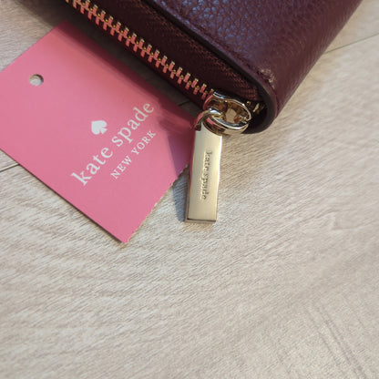 Kate Spade large Continental wallet in cherrywood pebbled leatherElevate your style with the Kate Spade Continental wallet in cherrywood pebbled leather. New with tags & gold hardware. Perfect organizer.$179.00Boston304