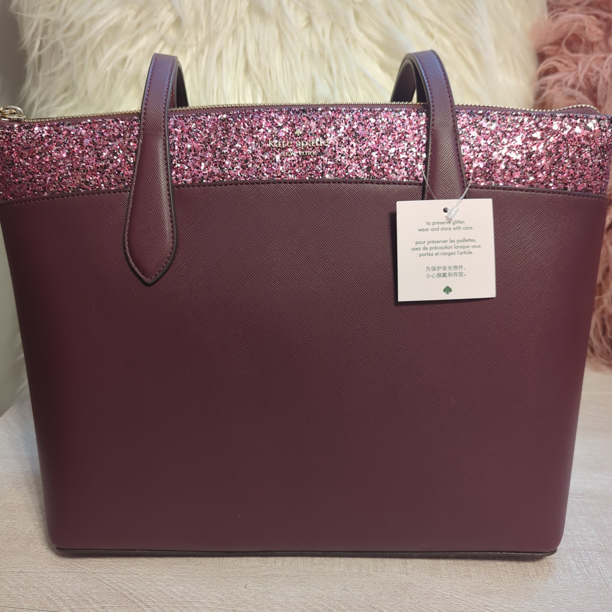 Kate Spade large tote in cherrywood/glitter detail & crossgrain leatherDiscover the elegant Kate Spade large tote in cherrywood with glitter detail & gold hardware. Perfect size at 14x11x6 inches. Shop luxury.$399.00Boston304