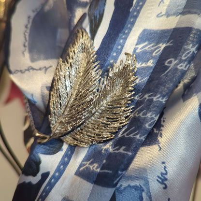 Vintage diamond cut silver leaf broochElevate your style with a stunning Vintage Diamond Cut Silver Leaf Brooch. Perfect for any event. Add sparkle to your look!$59.99Boston304