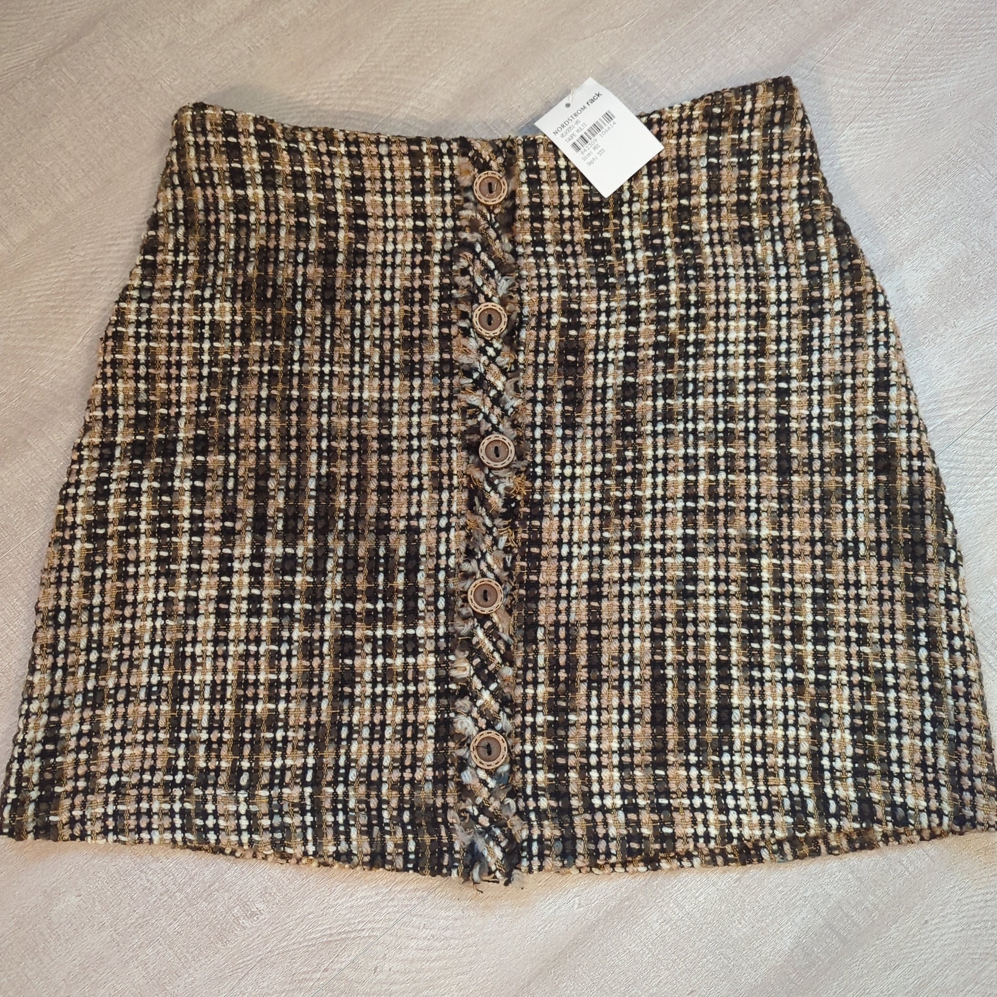 Whyte Eyelash Nordstrom Rack tweed skirtChic Whyte Eyelash tweed skirt with elegant wooden buttons. Versatile for any look. Size M: 15 waist, 19 hips, 17 L. Shop now!$45.00Boston304