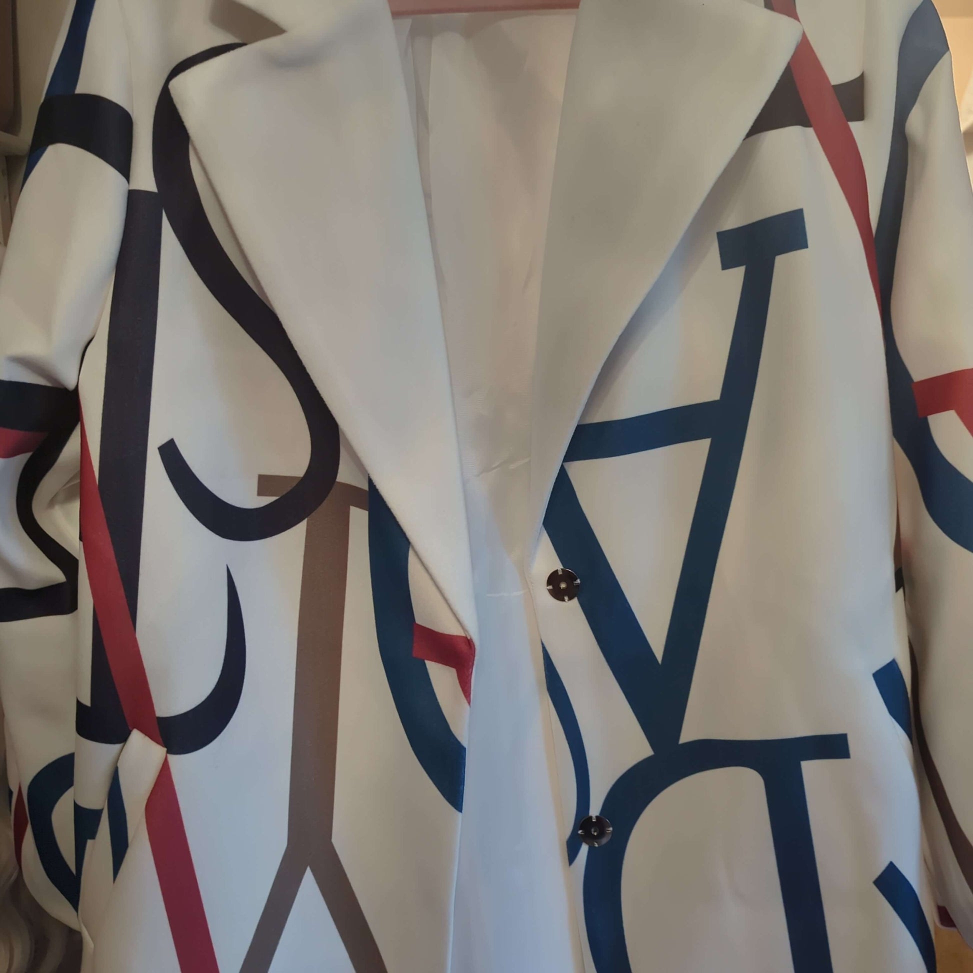 Gorgeous abstract letter print overcoatStand out in our XL cream overcoat with bold abstract lettering. Perfect oversized fit for comfort & style. Snag this glam piece now!$119.00Boston304