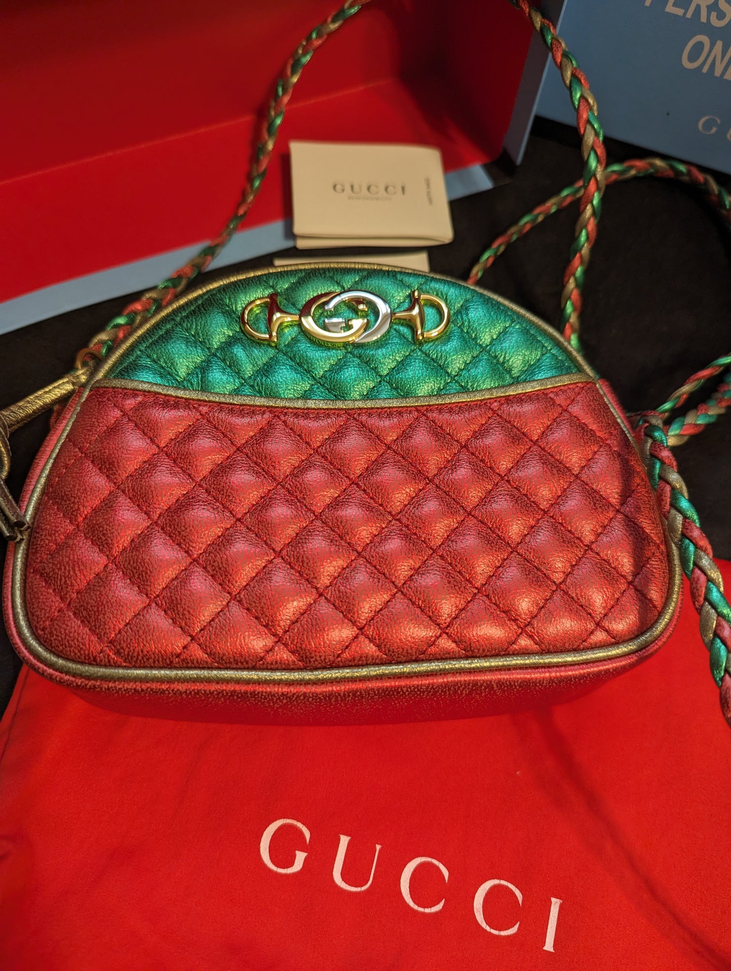 Gucci Trapuntata Quilted Metallic Calfskin Leather Crossbody Bag. Red, Gold, Green.Exclusive Gucci Trapuntata quilted bag in metallic red, gold & green. Mint with full inclusion. Shop your Italian-crafted luxury now!$1399.00Boston304