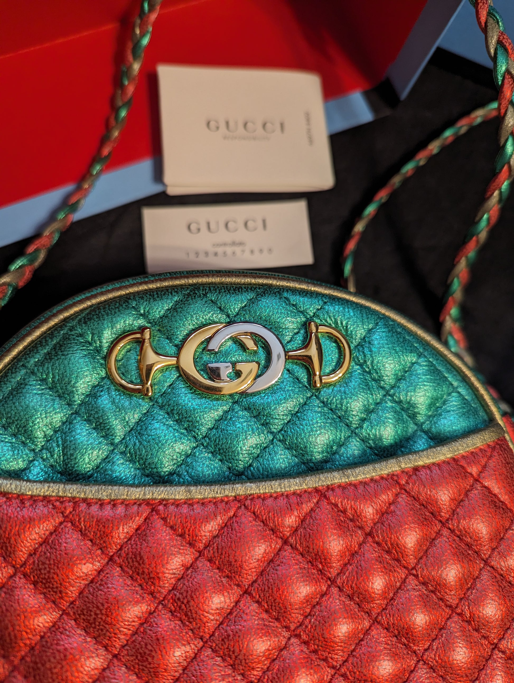 Gucci Trapuntata Quilted Metallic Calfskin Leather Crossbody Bag. Red, Gold, Green.Exclusive Gucci Trapuntata quilted bag in metallic red, gold & green. Mint with full inclusion. Shop your Italian-crafted luxury now!$1399.00Boston304