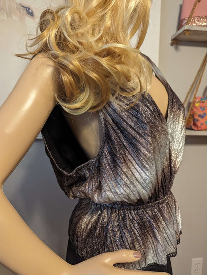 Letmebe hand crafted shimmery topDazzle in Letmebe's shimmery handcrafted top. Perfect fit with a cinched waist & stretch, comfortably lined. Shop now for a stunning look!$125.00Boston304