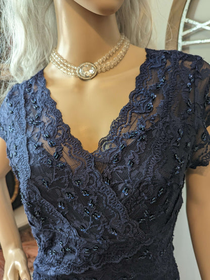 Cache layered lace & sequin dressElegant pre-owned Cache lace dress with sequins, size 12. Navy, with stretch, sheer neckline. Perfect fit & condition. Buy today!$49.00Boston304