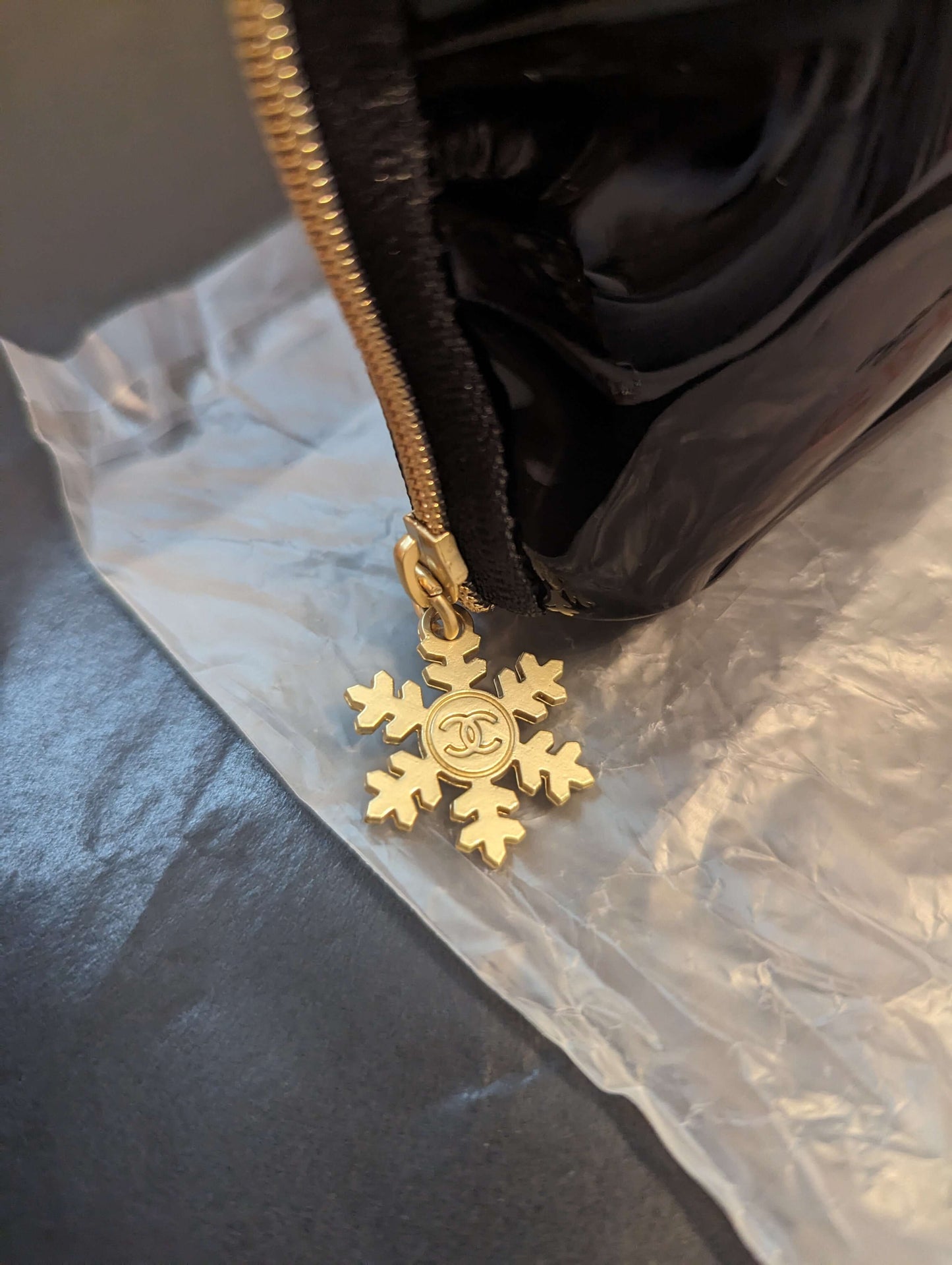 Chanel Beaute patent leather beauty bagElevate your makeup game with the Chanel Beaute black & gold beauty bag, featuring luxe patent leather and a chic snowflake zipper.$139.00Boston304