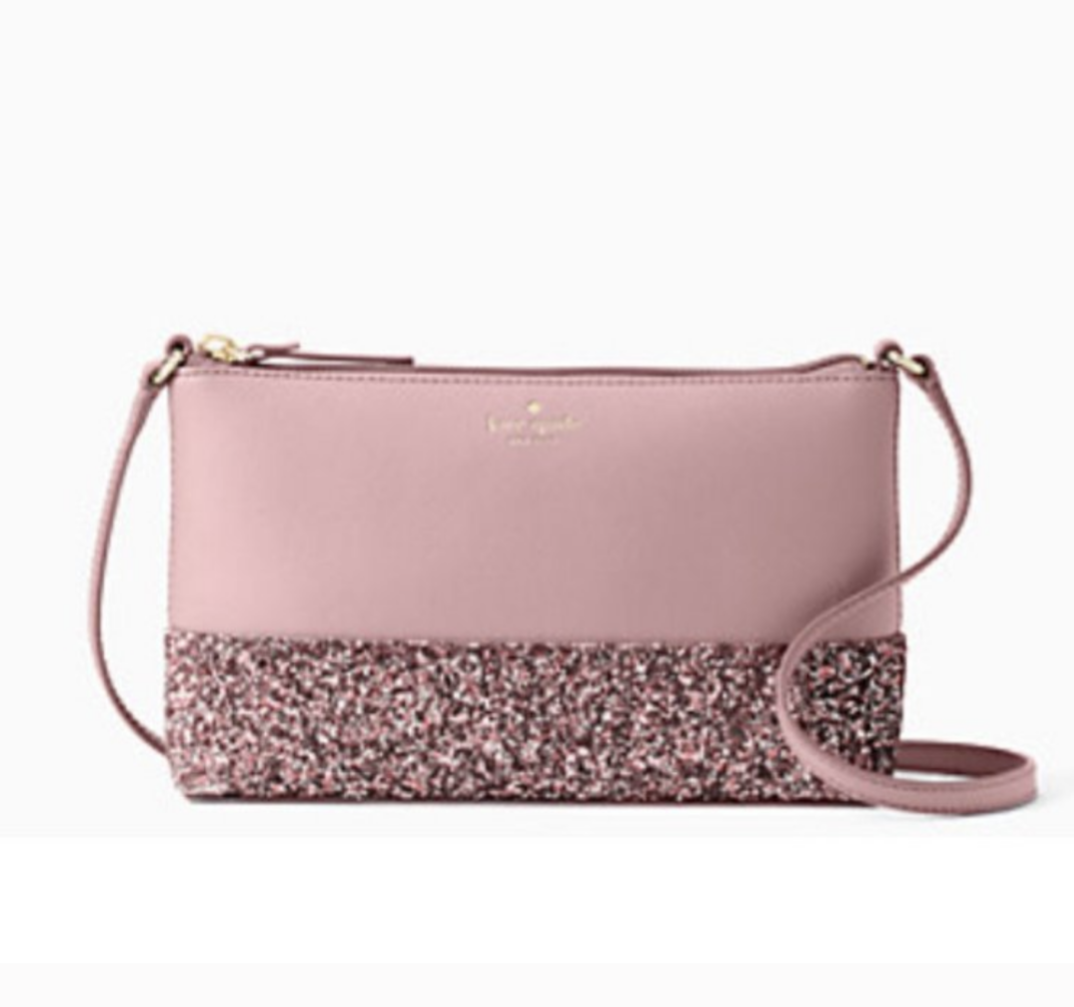 Kate Spade crossbody bag in mauve pink crossgrain leather with pink glitter detailShop this pristine Kate Spade crossbody in mauve with glitter detail. Gold hardware, 9x6 size. Looks unused with immaculate interior/exterior.$179.00Boston304