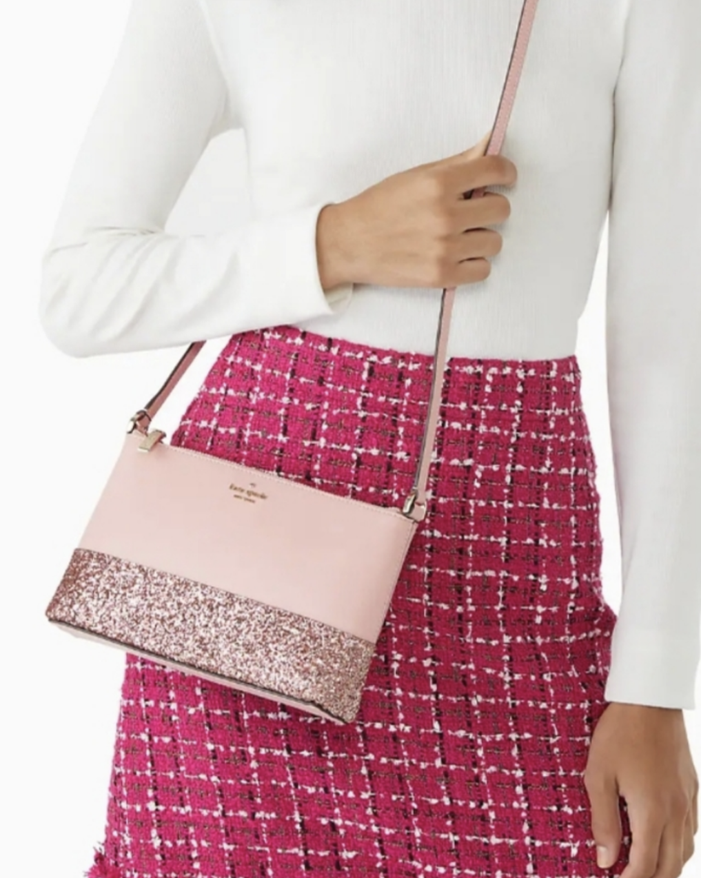 Kate Spade crossbody bag in mauve pink crossgrain leather with pink glitter detailShop this pristine Kate Spade crossbody in mauve with glitter detail. Gold hardware, 9x6 size. Looks unused with immaculate interior/exterior.$179.00Boston304