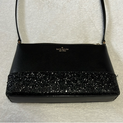 Kate Spade crossbody bag in black crossgrain leather with black glitter detailShop the pristine Kate Spade crossbody in black leather with glitter. Perfect size at 9x6. Elevate your style with this like-new gem.$179.00Boston304