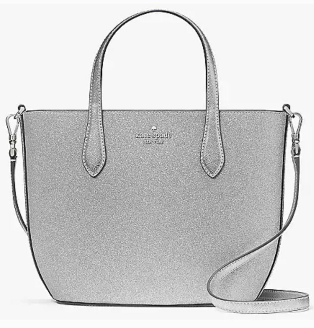 Kate Spade glimmer satchel in Lunar LightShine with Kate Spade Lunar Light Glimmer Satchel. Silver shimmer, sleek design, versatile straps. Perfect size 11x8x4. Limited availability!$199.00Boston304