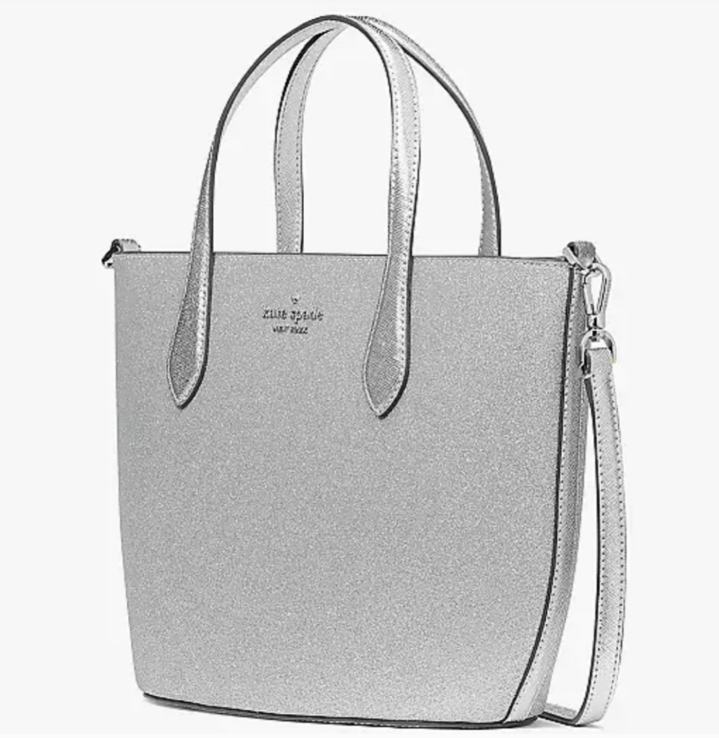 Kate Spade glimmer satchel in Lunar LightShine with Kate Spade Lunar Light Glimmer Satchel. Silver shimmer, sleek design, versatile straps. Perfect size 11x8x4. Limited availability!$199.00Boston304