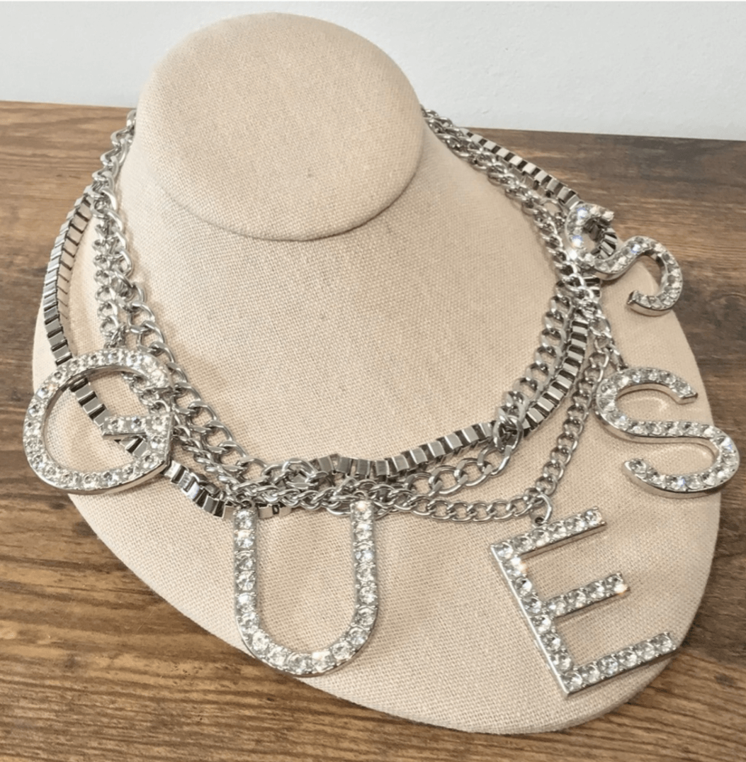 Guess vintage polished silver & crystal 3 chain oversized spell out statement necklaceStand out with this unique 17 Guess vintage necklace. Polished silver, crystal-embellished with a bold design. Ideal for fashion connoisseurs!$225.00Boston304