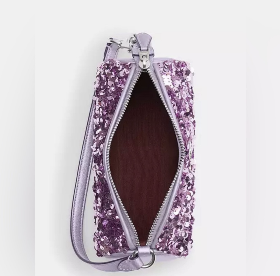 Coach Nolita Barrel Bag, Lilac sequinsShop the exclusive Coach Nolita Barrel Bag with sparkling lilac sequins. Perfect size for essentials. Brand new - see photos for size.$128.00Boston304