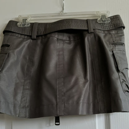 Burberry skirtElevate your style with this like-new Burberry metallic mini skirt, UK size 40 (US 4/5). Perfect to add a touch of glamour to any outfit.$900.00Boston304