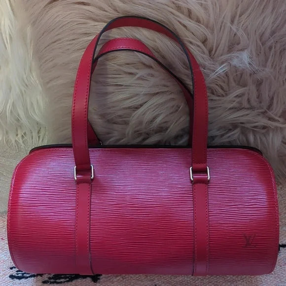 Louis Vuitton Epi SoufflotOwn the trendsetting Louis Vuitton Epi Soufflot in red. Excellent condition, April 1998, with authenticity certificate. Perfect fashion highlight.$999.00Boston304