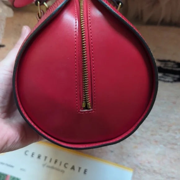 Louis Vuitton Epi SoufflotOwn the trendsetting Louis Vuitton Epi Soufflot in red. Excellent condition, April 1998, with authenticity certificate. Perfect fashion highlight.$999.00Boston304