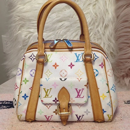 Louis Vuitton Murakami PriscillaOwn the exquisite Louis Vuitton Murakami Priscilla bag, in excellent condition with authenticity certificate. A timeless luxury piece.$1799.00Boston304