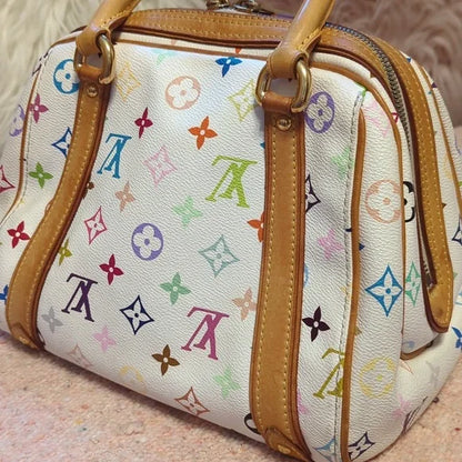 Louis Vuitton Murakami PriscillaOwn the exquisite Louis Vuitton Murakami Priscilla bag, in excellent condition with authenticity certificate. A timeless luxury piece.$1799.00Boston304