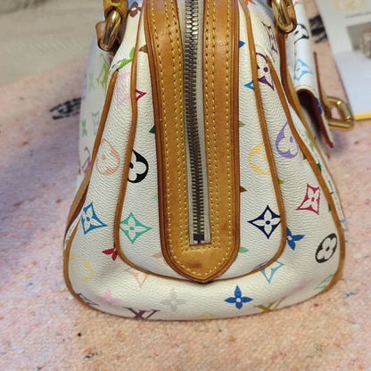 Louis Vuitton Murakami PriscillaOwn the exquisite Louis Vuitton Murakami Priscilla bag, in excellent condition with authenticity certificate. A timeless luxury piece.$1799.00Boston304