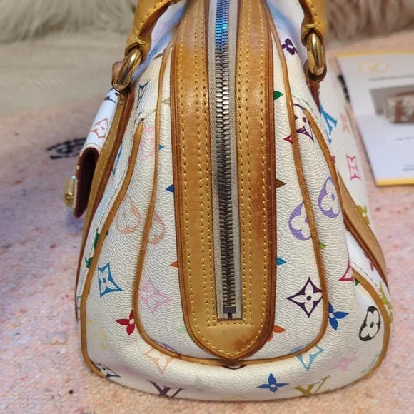 Louis Vuitton Murakami PriscillaOwn the exquisite Louis Vuitton Murakami Priscilla bag, in excellent condition with authenticity certificate. A timeless luxury piece.$1799.00Boston304