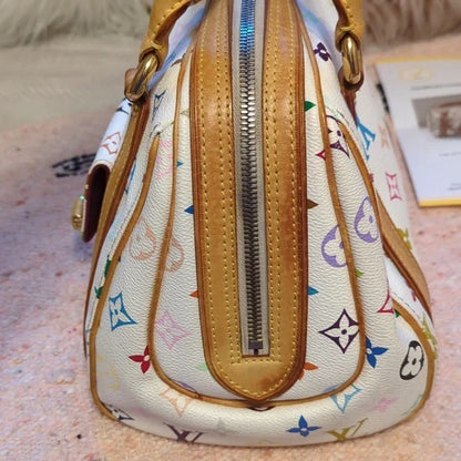 Louis Vuitton Murakami PriscillaOwn the exquisite Louis Vuitton Murakami Priscilla bag, in excellent condition with authenticity certificate. A timeless luxury piece.$1799.00Boston304