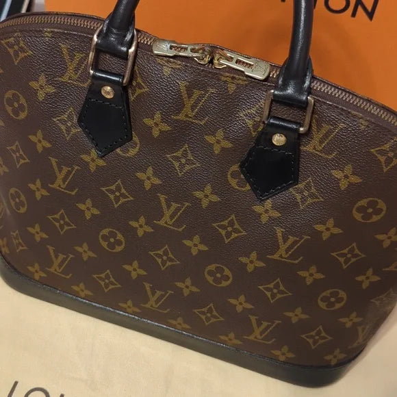 Louis Vuitton Alma BagShop the refurbished Louis Vuitton Alma Bag from Sep 1995. Iconic design, durable vachetta leather, includes charm & strap.$1149.00Boston304